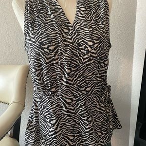 Sleeveless zebra silk wrap blouse.